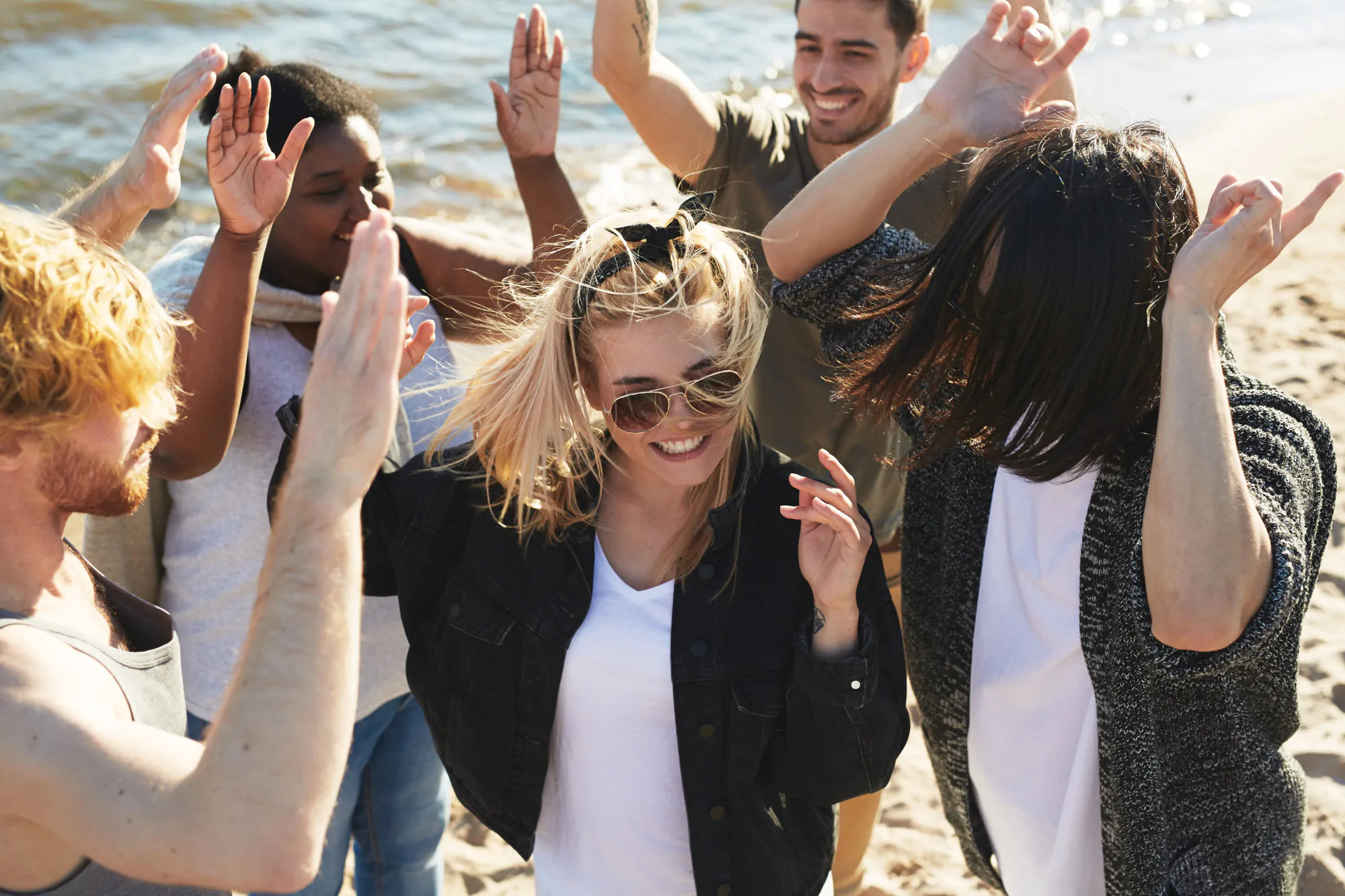 People dancing on the beach