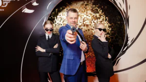 A man poses with a gun