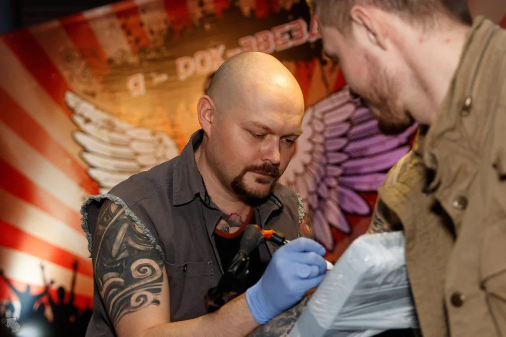 A man gets a tattoo