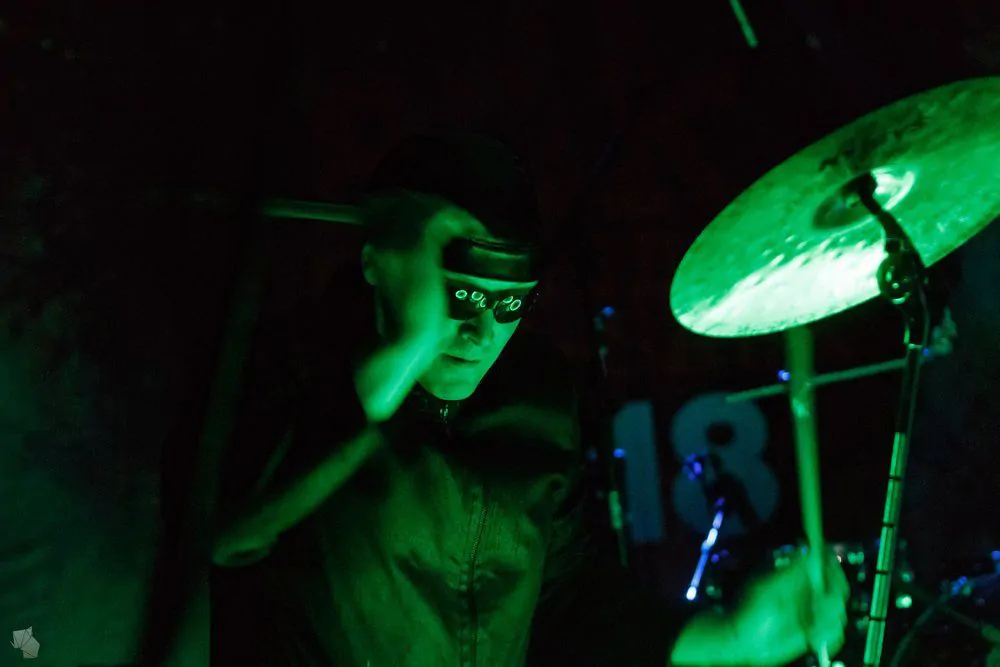 The drummer with glasses