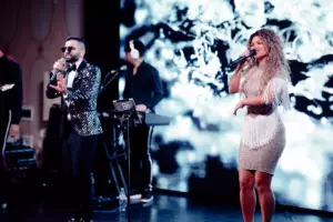 Musical performance by two singers