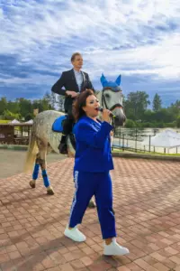 A man on a white horse