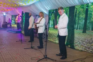 Singers in white jackets