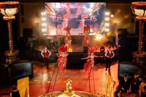 A vibrant stage performance with dancers