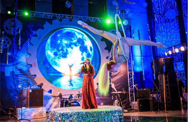 Acrobat shows a number in a gymnastic hoop