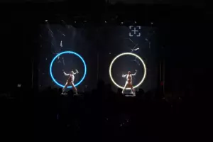 Artists on the background of glowing circles