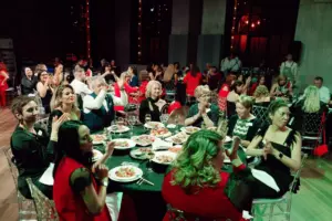 People are sitting at a set table