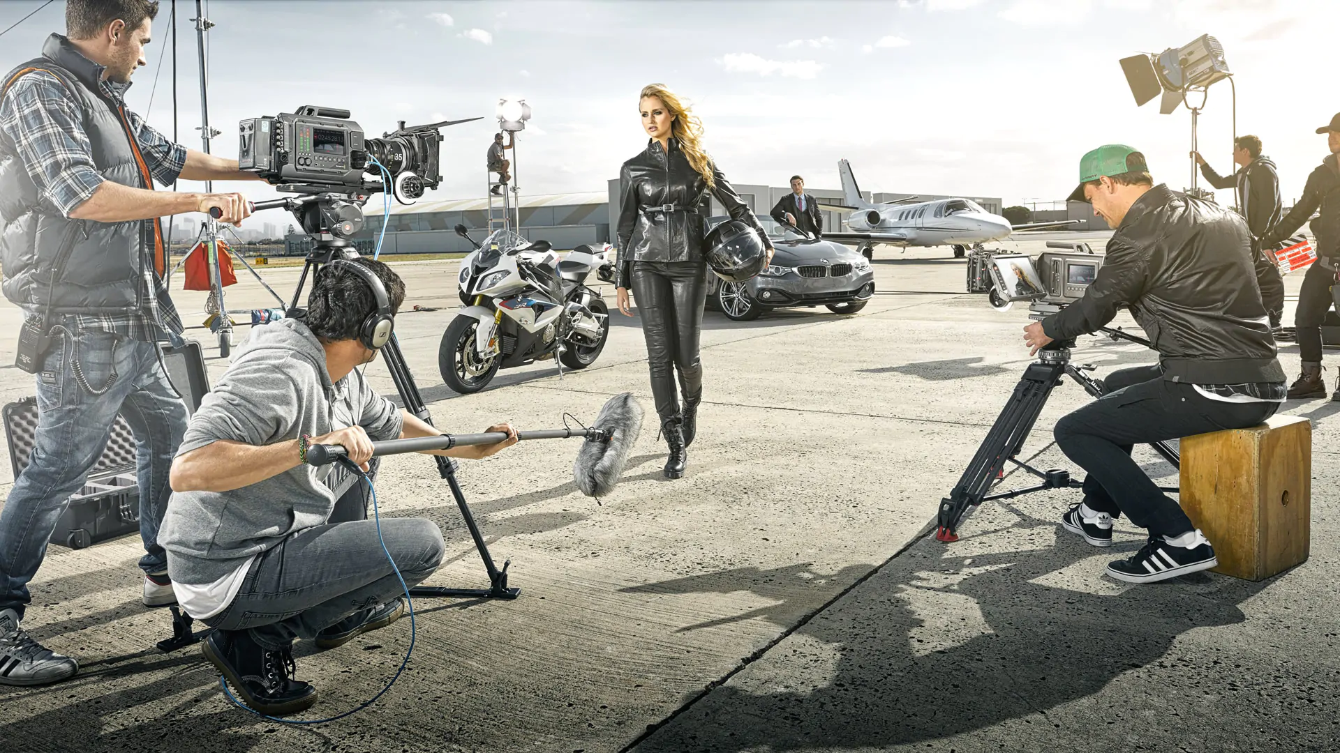 Stylish woman wearing leather near car and motorcycle Woman in leather outfit near car and motorcycle