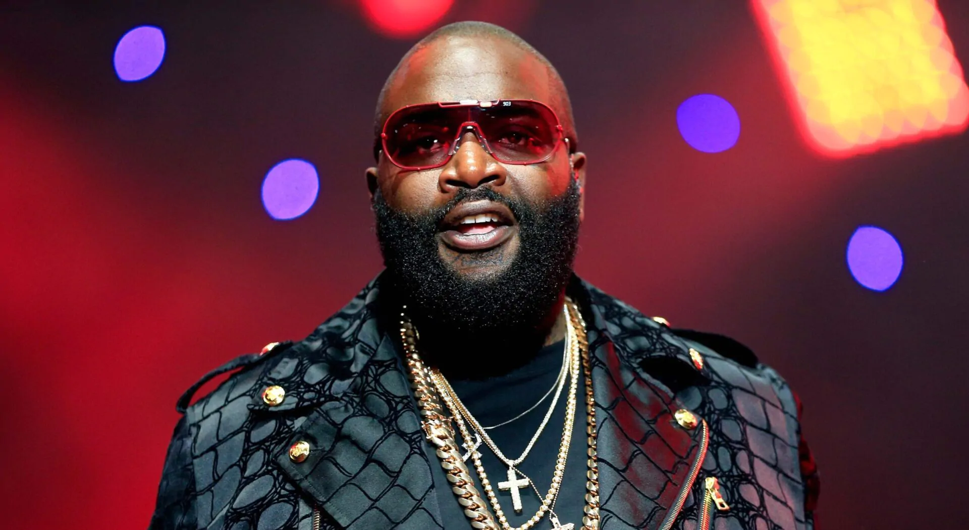 Rick Ross on stage singing