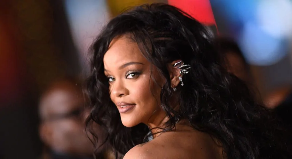 Rihanna live performance Singer Rihanna in concert outfit