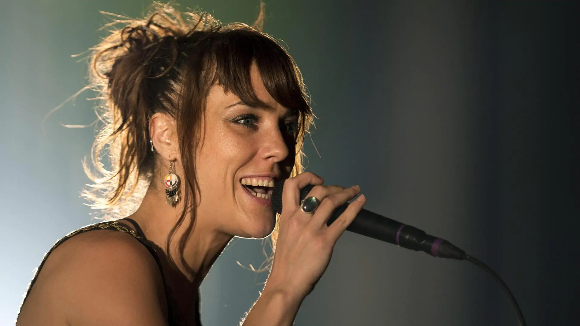 ZAZ with microphone during a show